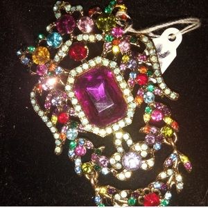 Creation your own look with colorful glass brooch.